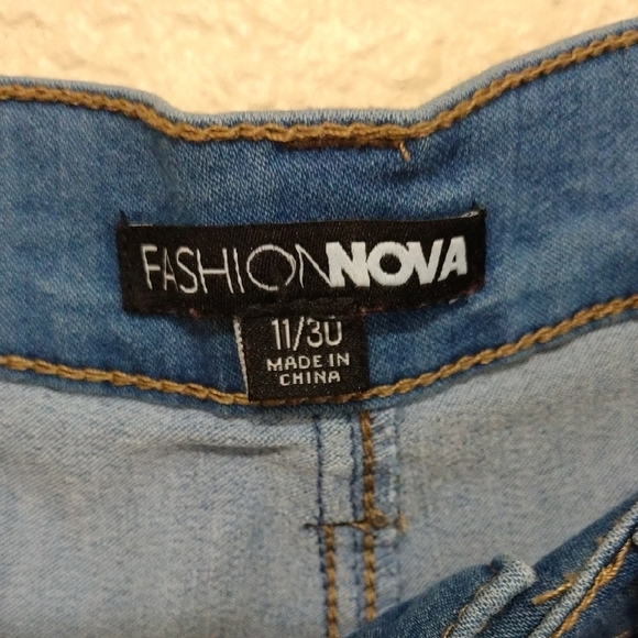 Fashion Nova Blue and Silver Flare Jeans - Picture 2 of 9